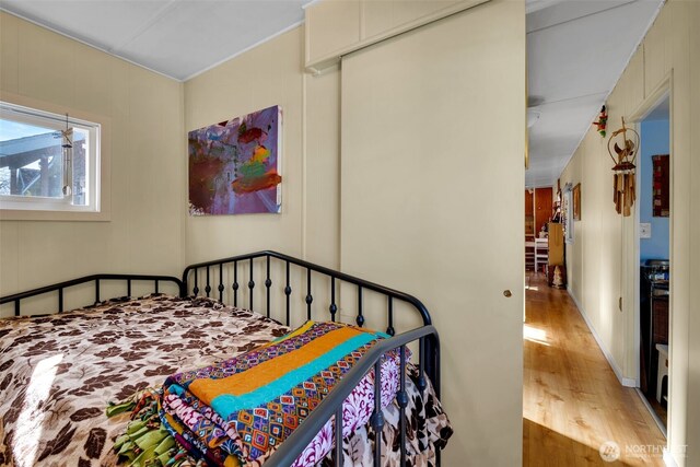 bedroom featuring wood finished floors