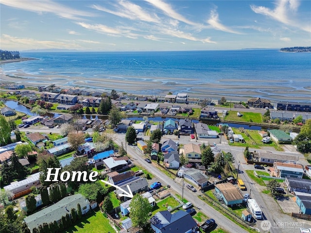 bird's eye view with a water view and a residential view