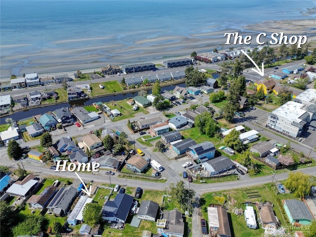 aerial view with a water view and a residential view