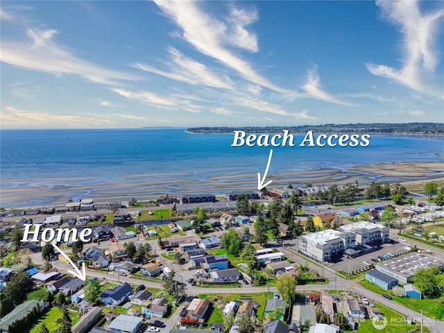 drone / aerial view featuring a water view
