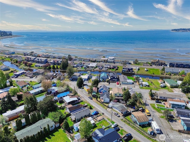 aerial view featuring a water view and a residential view