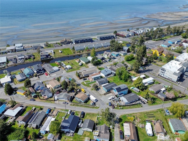 aerial view featuring a residential view and a water view