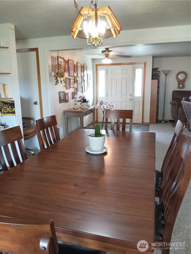 dining area featuring a ceiling fan