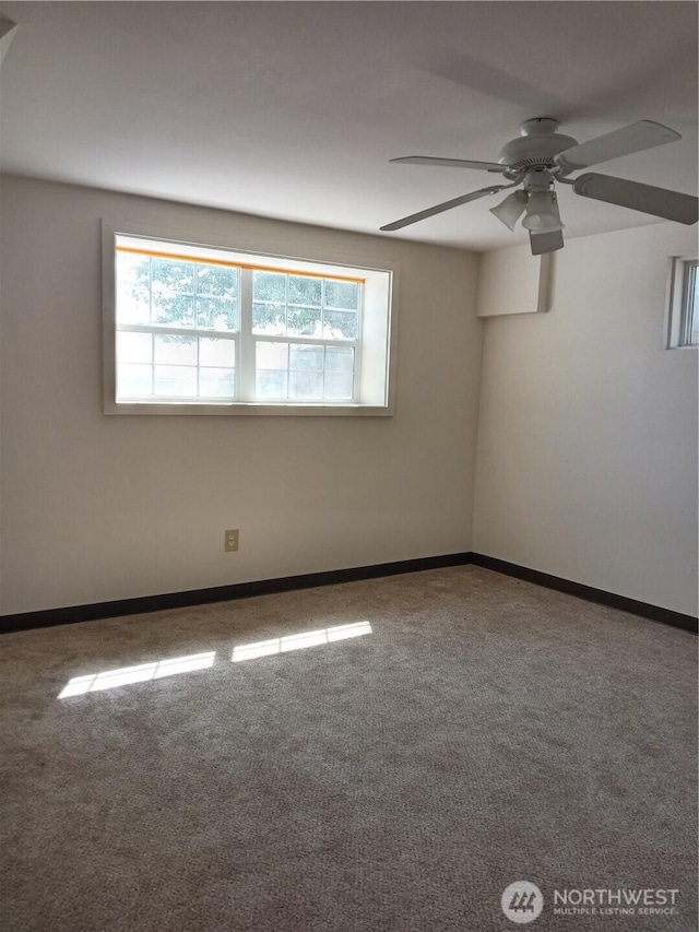 20868 SE Rd 2, Warden, WA 98857 - carpeted spare room with plenty of natural light and a ceiling fan