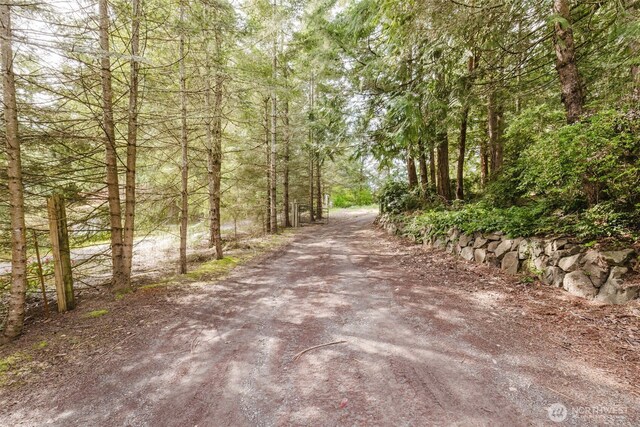 18142 NE Diamond Rd, Poulsbo, WA 98370 - view of road featuring a wooded view