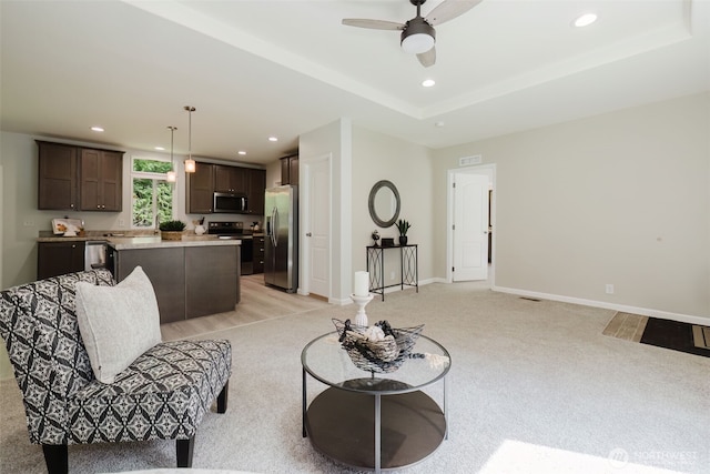 18142 NE Diamond Rd, Poulsbo, WA 98370 - living room featuring baseboards, visible vents, recessed lighting, light colored carpet, and a ceiling fan