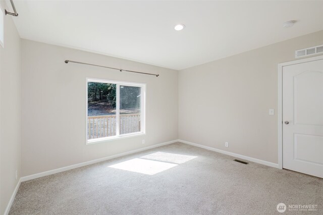18142 NE Diamond Rd, Poulsbo, WA 98370 - carpeted empty room featuring recessed lighting, visible vents, and baseboards