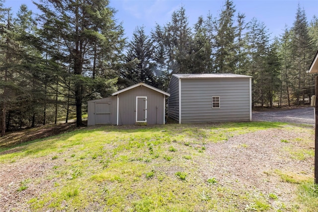 18142 NE Diamond Rd, Poulsbo, WA 98370 - view of yard featuring a storage shed and an outdoor structure