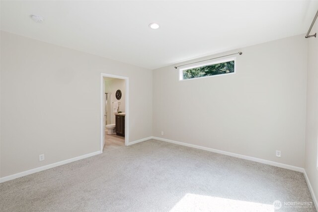 18142 NE Diamond Rd, Poulsbo, WA 98370 - unfurnished room featuring light carpet, baseboards, and recessed lighting