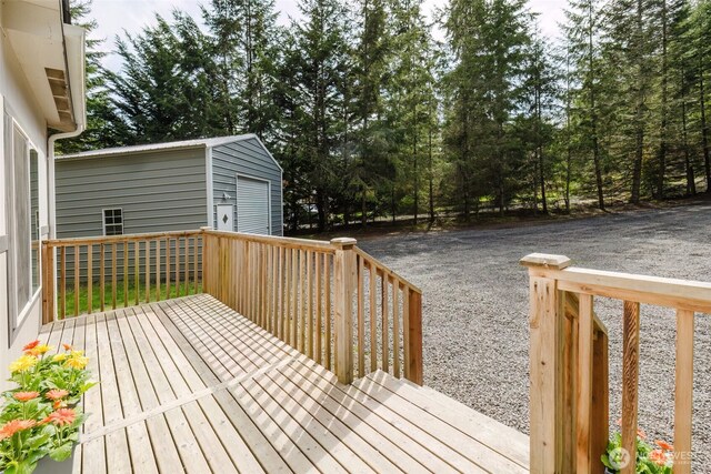 18142 NE Diamond Rd, Poulsbo, WA 98370 - deck featuring an outbuilding