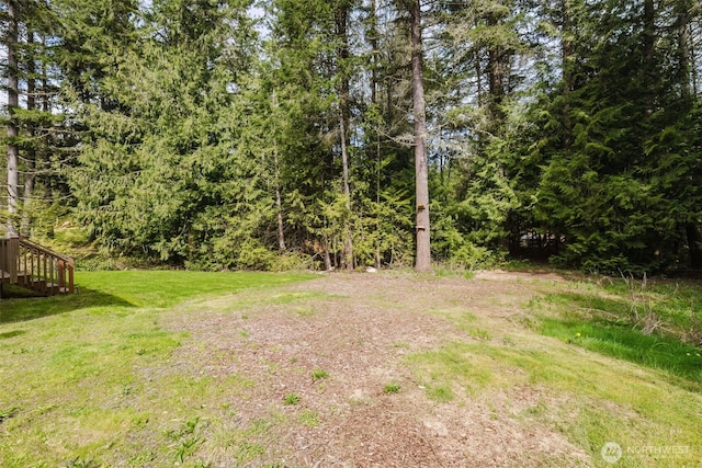 18142 NE Diamond Rd, Poulsbo, WA 98370 - view of yard with a wooded view