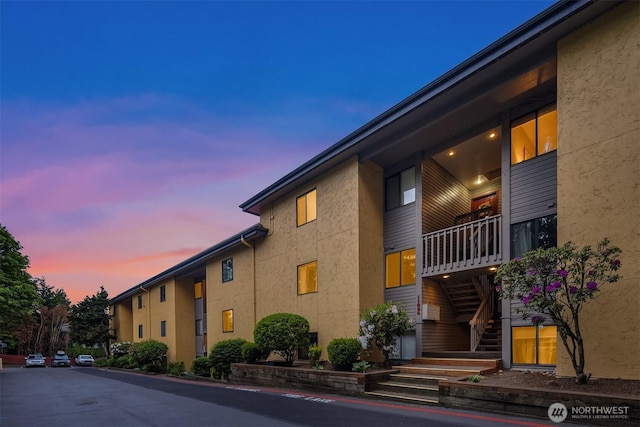 11634 100th Ave NE Unit 323, Kirkland, WA 98034 - property at dusk featuring stairway