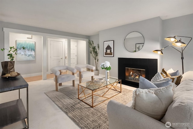 11634 100th Ave NE Unit 323, Kirkland, WA 98034 - living area with a tile fireplace and baseboards