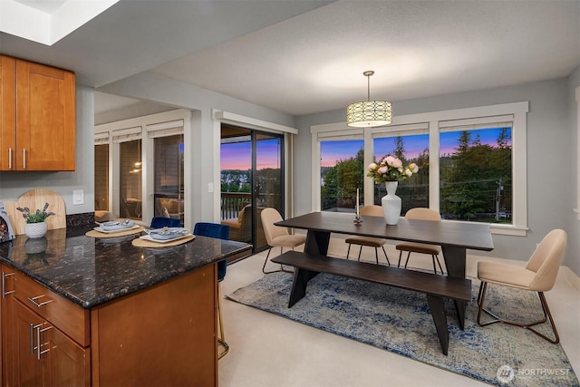 11634 100th Ave NE Unit 323, Kirkland, WA 98034 - dining area with light colored carpet