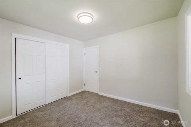 3335 Trenton Ave NE, Bremerton, WA 98310 - unfurnished bedroom featuring carpet, baseboards, and a closet