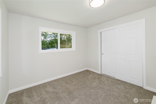 3335 Trenton Ave NE, Bremerton, WA 98310 - unfurnished bedroom with carpet flooring, baseboards, and a closet