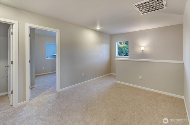 18218 37th Ave E, Tacoma, WA 98446 - carpeted empty room with visible vents and baseboards