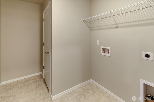 18218 37th Ave E, Tacoma, WA 98446 - washroom with baseboards, hookup for an electric dryer, hookup for a washing machine, and laundry area