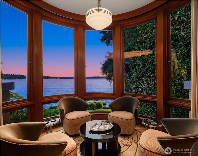sunroom with a water view
