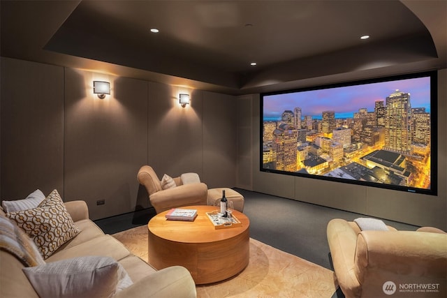 cinema with recessed lighting, carpet flooring, and a tray ceiling