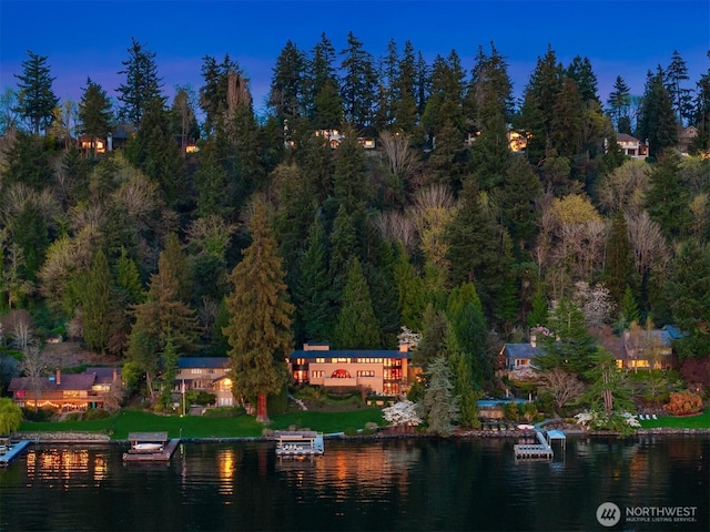 birds eye view of property featuring a water view
