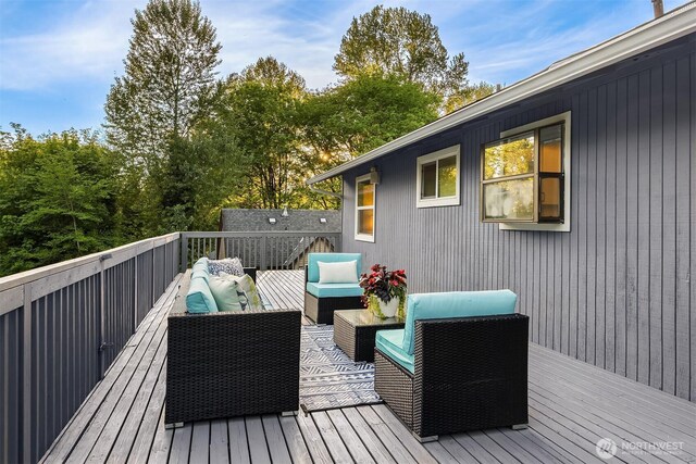 deck featuring an outdoor living space