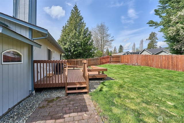 21850 SE 271st Pl, Maple Valley, WA 98038 - view of yard featuring a fenced backyard and a wooden deck
