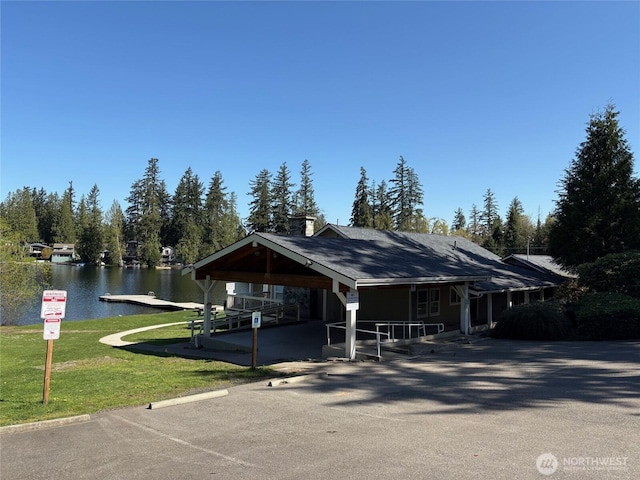 21850 SE 271st Pl, Maple Valley, WA 98038 - view of front of home with a front yard and a water view