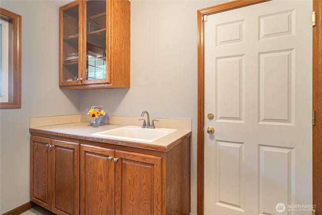 bathroom featuring vanity and baseboards