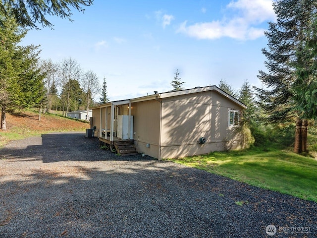 151 Deer Haven Dr, Winlock, WA 98596 - view of home's exterior featuring crawl space and driveway