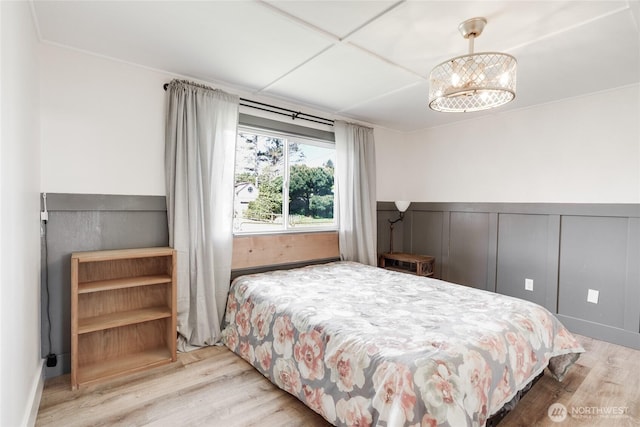 1401 264th Pl, Ocean Park, WA 98640 - bedroom featuring a wainscoted wall and wood finished floors