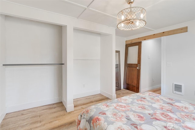 1401 264th Pl, Ocean Park, WA 98640 - bedroom featuring baseboards, visible vents, and wood finished floors
