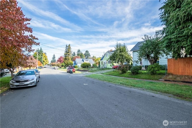 view of street featuring sidewalks and a residential view