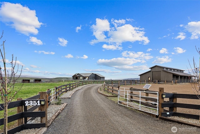 2351 Lower Green Canyon Rd, Ellensburg, WA 98926 - view of street featuring a rural view, an outbuilding, driveway, and an exterior structure