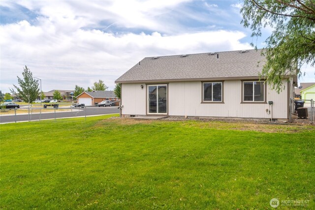 1310 W Virginia St, Moses Lake, WA 98837 - back of house featuring a shingled roof