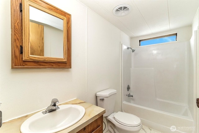 bathroom featuring visible vents, toilet, vanity, and tub / shower combination
