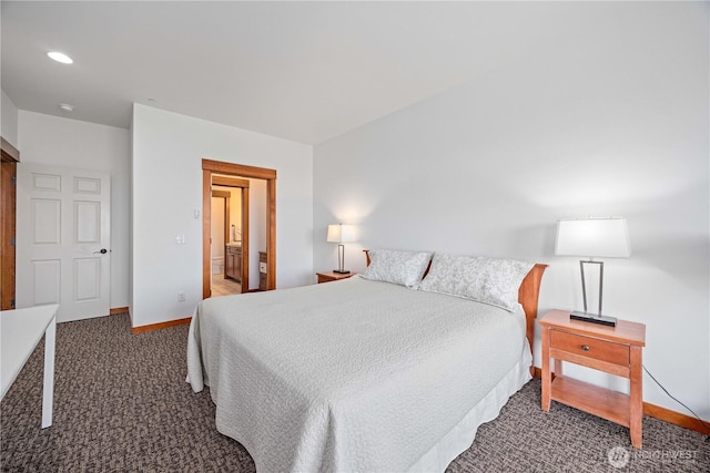 carpeted bedroom with baseboards