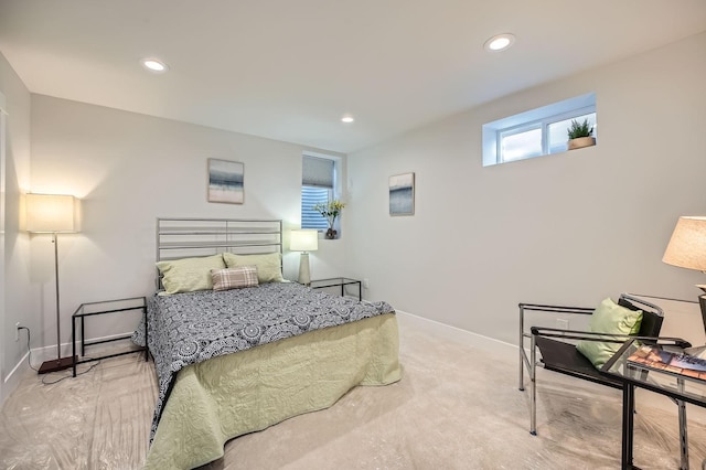 bedroom featuring baseboards and recessed lighting