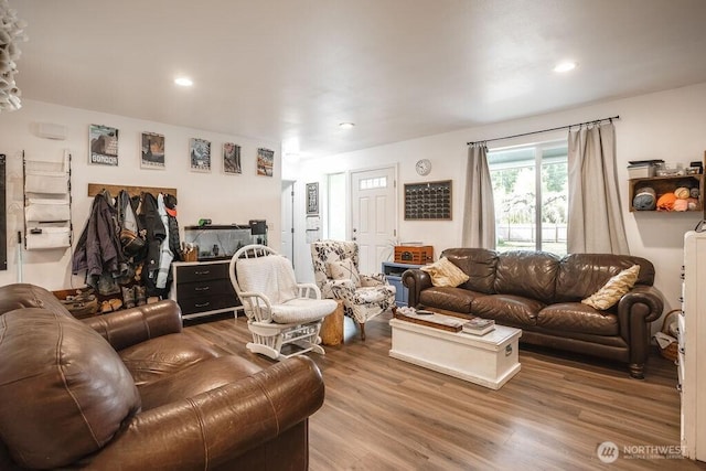 living area featuring recessed lighting and wood finished floors