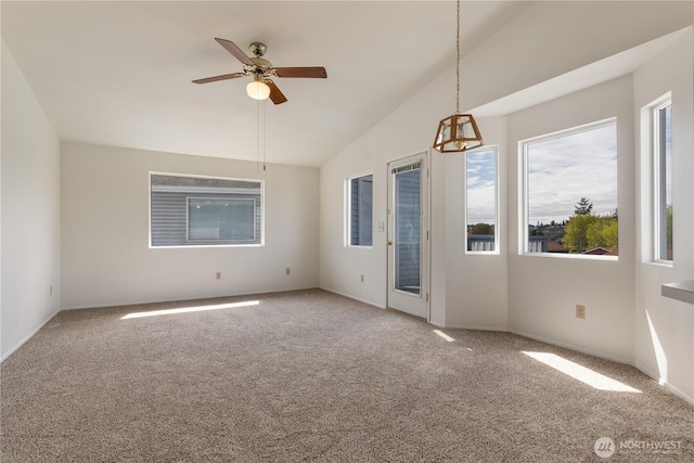 730 SE 8th Ave Unit G202, Oak Harbor, WA 98277 - spare room with baseboards, vaulted ceiling, a ceiling fan, and carpet floors
