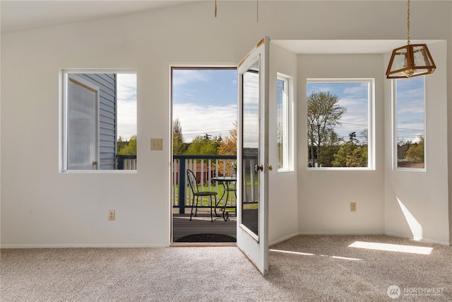 730 SE 8th Ave Unit G202, Oak Harbor, WA 98277 - doorway to outside with a wealth of natural light, carpet, and baseboards