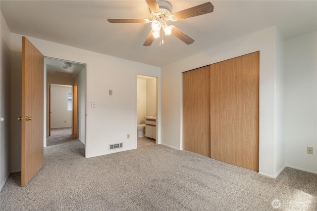 730 SE 8th Ave Unit G202, Oak Harbor, WA 98277 - unfurnished bedroom with a closet, light colored carpet, a ceiling fan, and visible vents