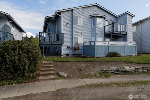 730 SE 8th Ave Unit G202, Oak Harbor, WA 98277 - rear view of house with stairs