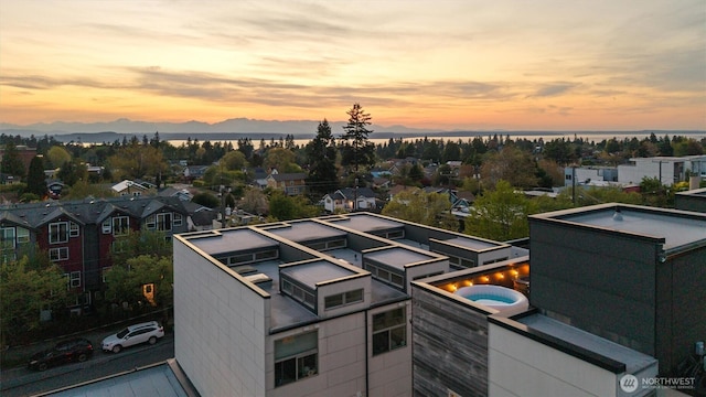 aerial view featuring a mountain view and a residential view