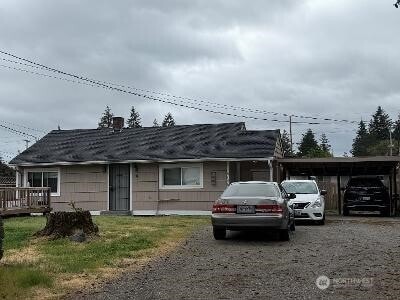 6146 SW 88th St SW, Lakewood, WA 98499 - view of front of property with a detached carport and driveway