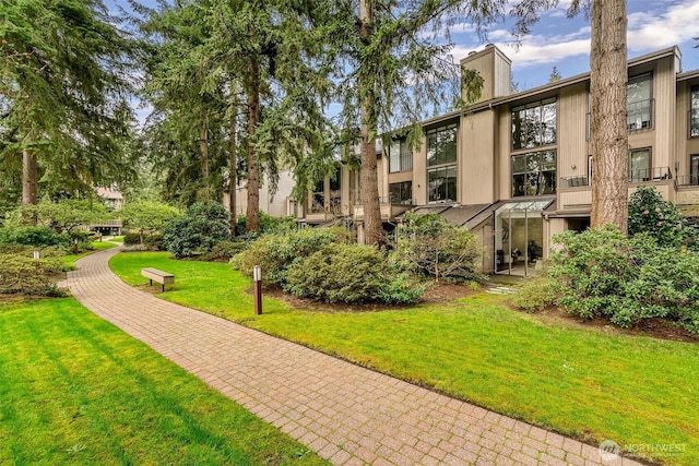 13730 15th Ave NE Unit F-103, Seattle, WA 98125 - view of home's community featuring a lawn