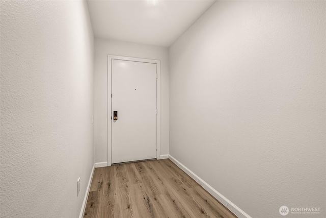 13730 15th Ave NE Unit F-103, Seattle, WA 98125 - doorway featuring light wood finished floors and baseboards