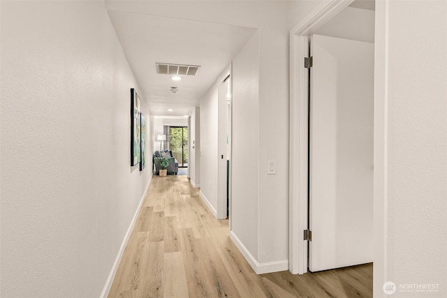 13730 15th Ave NE Unit F-103, Seattle, WA 98125 - corridor featuring light wood finished floors, baseboards, and recessed lighting