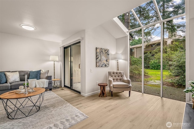 13730 15th Ave NE Unit F-103, Seattle, WA 98125 - living area with wood finished floors and baseboards