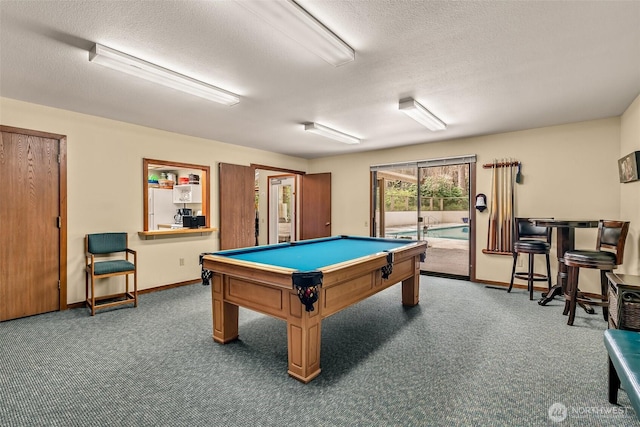 13730 15th Ave NE Unit F-103, Seattle, WA 98125 - rec room with carpet flooring, a textured ceiling, pool table, and baseboards